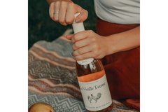 Image Opening wine bottle.